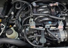 Load image into Gallery viewer, J&amp;L 16-24 Nissan Titan 5.6L Passenger Side Oil Separator 3.0 - Black Anodized - Detail View