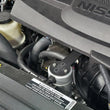 Load image into Gallery viewer, J&amp;L 16-24 Nissan Titan 5.6L Passenger Side Oil Separator 3.0 - Clear Anodized - Side View