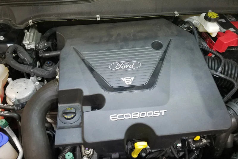 J&L 17-19 Ford Fusion Sport 2.7L Passenger Side Oil Separator 3.0 - Black Anodized - Detail View