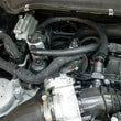 Load image into Gallery viewer, J&amp;L 17-19 Ford Fusion Sport 2.7L Passenger Side Oil Separator 3.0 - Clear Anodized - Side View