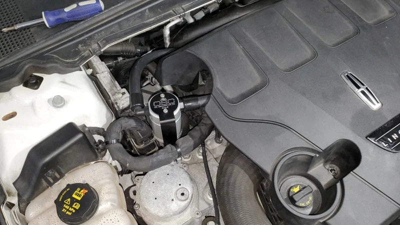 J&L 17-20 Lincoln Continental/MKZ 3.0L EcoBoost Passenger Side Oil Separator 3.0 - Clear Anodized - Detail View
