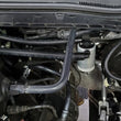 Load image into Gallery viewer, J&amp;L 17-22 Ford F-250 6.2L/7.3L Passenger Side Oil Separator 3.0 - Clear Anodized - Side View