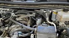 Load image into Gallery viewer, J&amp;L 17-24 Nissan Armada / 14-24 Infiniti QX80 5.6L Driver Side Oil Separator 3.0 - Clear Anodize - Side View