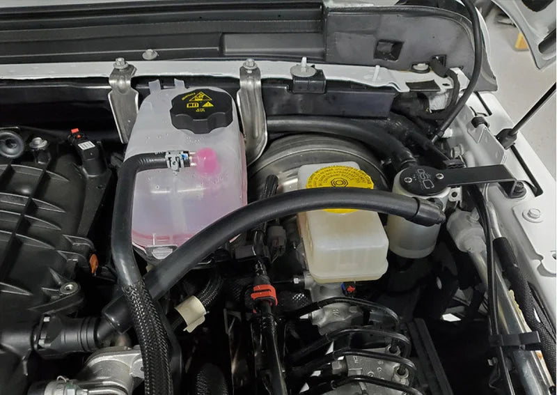 J&L 18-25 Jeep Wrangler JL 3.6L Driver Side Oil Separator 3.0 - Clear Anodized - Side View