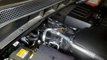 Load image into Gallery viewer, J&amp;L 19-23 Chevy Silverado/GMC Sierra 1500 2.7L Passenger Side Oil Separator 3.0 - Clear Anodized - Side View