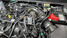 Load image into Gallery viewer, J&amp;L 19-24 Ford/Lincoln SUVs &amp; Trucks w 2.0 EcoBoost Driver Side Oil Separator 3.0 - Clear An - Side View
