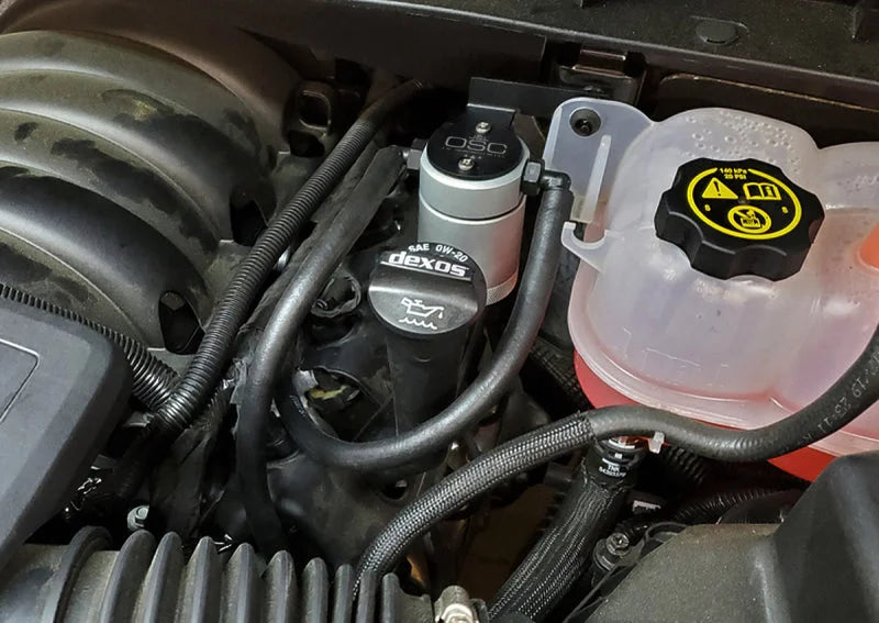 J&L 19-25 Chevrolet Silverado/GMC Sierra 1500 5.3L V8 Driver Side Oil Separator 3.0 - Clear Anodized - Side View
