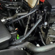 Load image into Gallery viewer, J&amp;L 20-25 Chevy Silverado/GMC Sierra 2500/3500 6.6L Drivers Side Oil Separator 3.0 - Black Anodized - Side View