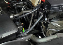 Load image into Gallery viewer, J&amp;L 20-25 Chevy Silverado/GMC Sierra 2500/3500 6.6L Drivers Side Oil Separator 3.0 - Black Anodized - Side View