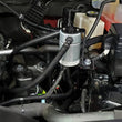 Load image into Gallery viewer, J&amp;L 20-25 Chevy Silverado/GMC Sierra 2500/3500 6.6L Drivers Side Oil Separator 3.0 - Clear Anodized - Side View