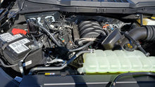 Load image into Gallery viewer, J&amp;L 2011-2025 Ford F-150 2.7L/3.5L/5.0L Passenger Side Oil Separator 3.0 - Black Anodized - Side View