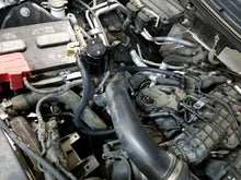 Load image into Gallery viewer, J&amp;L 2011-2025 Ford F-150 2.7L/3.5L/5.0L Passenger Side Oil Separator 3.0 - Black Anodized - Installation View