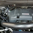 Load image into Gallery viewer, J&amp;L 2011-2025 Ford F-150 2.7L/3.5L/5.0L Passenger Side Oil Separator 3.0 - Black Anodized - Additional View 6