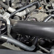 Load image into Gallery viewer, J&amp;L 2015-2017 Ford Expedition 3.5L EcoBoost Oil Separator 3.0 - Black Anodized - Detail View