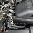Load image into Gallery viewer, J&amp;L 2015-2017 Ford Expedition 3.5L EcoBoost Oil Separator 3.0 - Clear Anodized - Side View