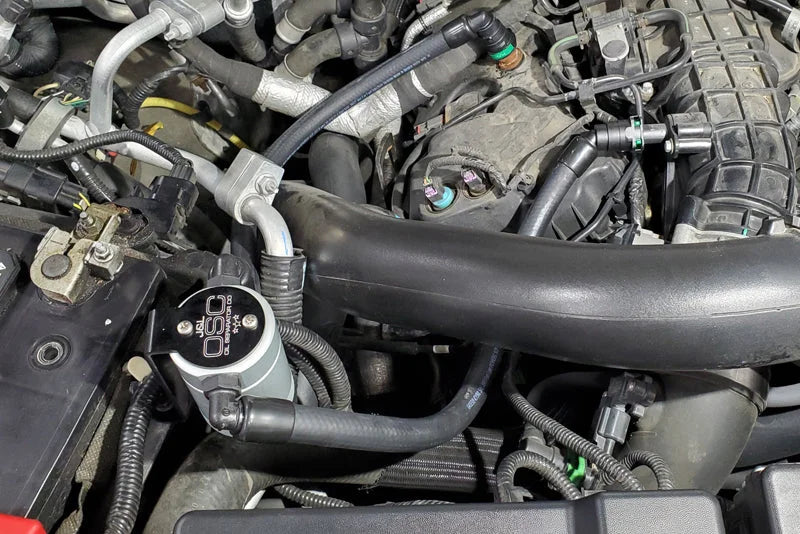 J&L 2015-2017 Ford Expedition 3.5L EcoBoost Oil Separator 3.0 - Clear Anodized - Detail View