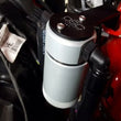 Load image into Gallery viewer, J&amp;L 2015-2023 Ford Mustang EcoBoost Driver Side Oil Separator 3.0 - Clear Anodized - Side View