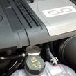 Load image into Gallery viewer, J&amp;L 2018-2023 Ford Mustang GT Passenger Side Oil Separator 3.0 - Clear Anodized - Side View