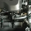 Load image into Gallery viewer, J&amp;L 2019-2024 Dodge Ram 1500 5.7L Oil Separator 3.0 Passenger Side - Black Anodized - Side View