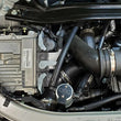 Load image into Gallery viewer, J&amp;L 2020-2025 Ford Explorer 3.0L EcoBoost Oil Separator 3.0 Passenger Side - Clear Anodized - Side View