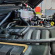 Load image into Gallery viewer, J&amp;L 2021-2024 Jeep Wrangler 392 Oil Separator 3.0 Passenger Side - Black Anodized - Side View