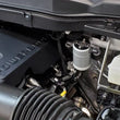 Load image into Gallery viewer, J&amp;L 2021-2025 Ford F-150 3.5L Passenger Side Oil Separator 3.0 - Clear Anodized - Side View