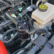 Load image into Gallery viewer, J&amp;L 2021.5-2024 Ford Bronco 2.3L EcoBoost Oil Separator 3.0 Passenger Side - Black Anodized - Side View