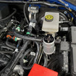 Load image into Gallery viewer, J&amp;L 2021.5-2024 Ford Bronco 2.3L EcoBoost Oil Separator 3.0 Passenger Side - Clear Anodized - Side View