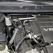 Load image into Gallery viewer, J&amp;L 2022-2025 Nissan Frontier 3.8L V6 Passenger Side Oil Separator 3.0 - Clear Anodized - Side View
