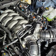 Load image into Gallery viewer, J&amp;L 2024-2025 Ford Mustang 5.0L Oil Separator 3.0 PCV Side - Black Anodized - Detail View