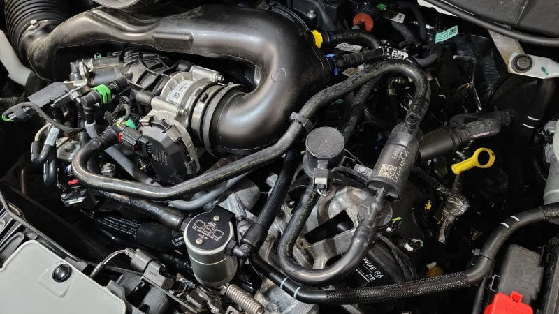 J&L 2025 Ford Transit 150/250/350 3.5L Oil Separator - Clear Anodized - Side View