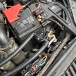 Load image into Gallery viewer, J&amp;L 22-24 Ford Bronco Raptor 3.0L EcoBoost PCV Side Oil Separator 3.0 - Black Anodized - Detail View