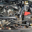 Load image into Gallery viewer, J&amp;L 22-24 Ford Bronco Raptor 3.0L EcoBoost PCV Side Oil Separator 3.0 - Clear Anodized - Detail View