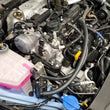 Load image into Gallery viewer, J&amp;L 22-25 Hyundai Elantra N 2.0L Oil Separator 3.0 Passenger Side - Black Anodized - Side View