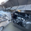 Load image into Gallery viewer, J&amp;L 22-25 Nissan Pathfinder / 22-24 Infiniti QX60 3.5L PCV Side Oil Separator 3.0 - Blk Anodized - Back View