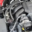 Load image into Gallery viewer, J&amp;L 22-25 Subaru BRZ/GR86 2.4L Passenger Side Oil Separator 3.0 - Black Anodized - Side View