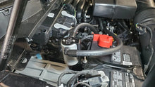 Load image into Gallery viewer, J&amp;L 23-25 Ford F-250/F-350 6.8L;7.3L Oil Separator 3.0 Passenger Side - Clear Anodized - Side View