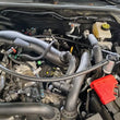 Load image into Gallery viewer, J&amp;L 24-25 Ford Ranger Raptor 3.0L PCV Side Oil Separator - Clear Anodized - Detail View