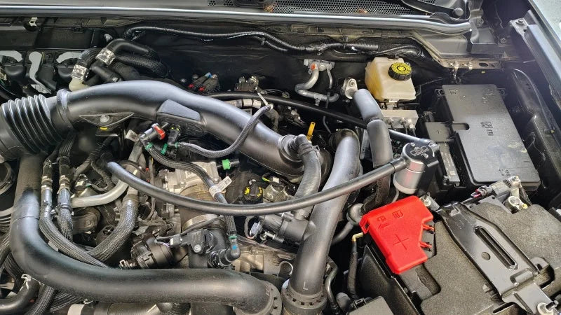 J&L 24-25 Ford Ranger Raptor 3.0L PCV Side Oil Separator - Clear Anodized - Detail View