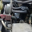 Load image into Gallery viewer, J&amp;L 95-04 Toyota Tacoma/4Runner 3.4L Driver Side Oil Separator 3.0 - Black Anodized - Side View