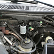Load image into Gallery viewer, J&amp;L 99-04 Ford Lightning Driver Side Oil Separator 3.0 - Clear Anodized