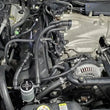 Load image into Gallery viewer, J&amp;L 03-04 Mercury Marauder Passenger Side Oil Separator 3.0 - Clear Anodized - Side View