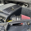 Load image into Gallery viewer, JLT 11-20 Dodge Durango/Jeep Grand Cherokee 5.7L Black Textured Cold Air Intake Kit w/Red Filter - Main Product View