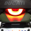 Load image into Gallery viewer, Joker Machine Side-mount LED Turn Signals - Black/Red 05-206-RB - Side View