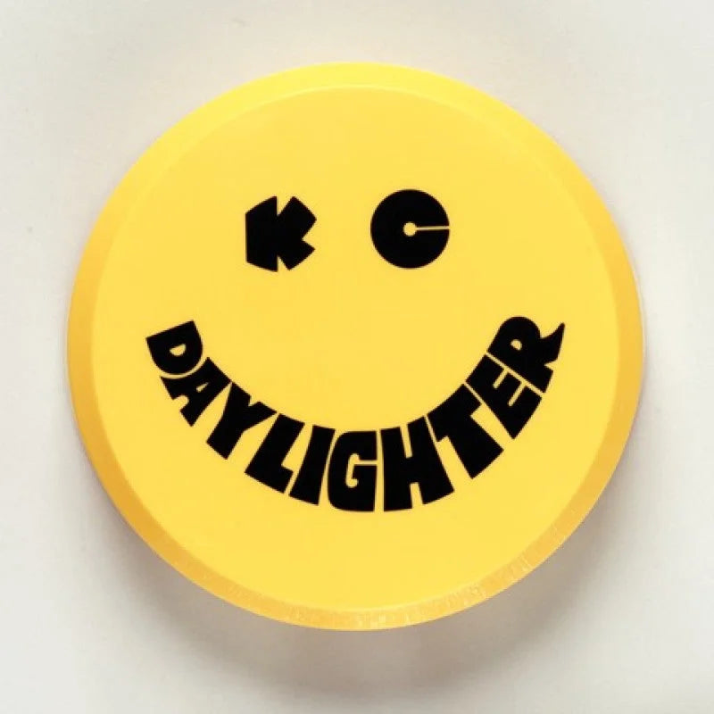 KC HiLiTES 6in. Round Hard Cover for Daylighter/SlimLite/Pro-Sport (Single) - Yellow w/Black Smile - Side View
