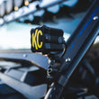 Load image into Gallery viewer, KC HiLiTES FLEX ERA 1 Single Light Cover ONLY (Black/Yellow KC Logo) - Installation View