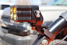Load image into Gallery viewer, KC HiLiTES Universal 40 Deg. A-Pillar Tube Clamp Light Mount (1.5-2in. Diameter Bars) - Pair - Side View