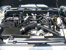 Load image into Gallery viewer, K&amp;N 07-10 Jeep Wrangler 3.8L V6 Drop In Air Filter - Installation View