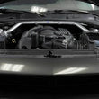 Load image into Gallery viewer, K&amp;N 11-21 Dodge Challenger 6.4L V8 (Gas) Catch Can Oil Separator - Installation View