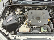 Load image into Gallery viewer, K&amp;N 15-22 Toyota Hilux L4-2.5L DSL Performance Air Intake System - Side View